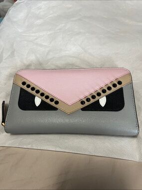 Authentic Fendi Monster eye wallet with studs